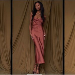 Rust colored midi dress. Never worn. Size medium.